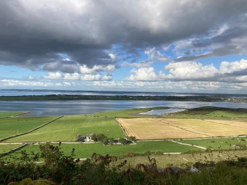 an aerial view of a large body of water at The Burren Snug in Galway