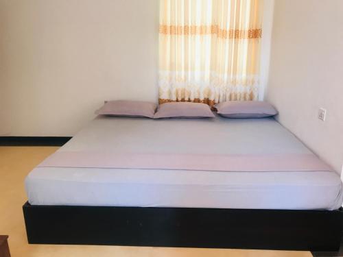 Postel nebo postele na pokoji v ubytování Hotel Ganthera Kataragama