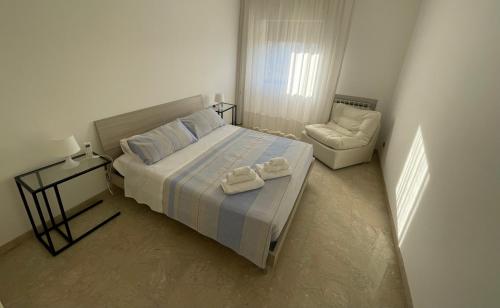 Posteľ alebo postele v izbe v ubytovaní Pescara49 Centralissimo Appartamento