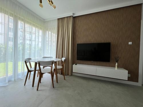 TV a/nebo společenská místnost v ubytování Apartament na Gdańskiej