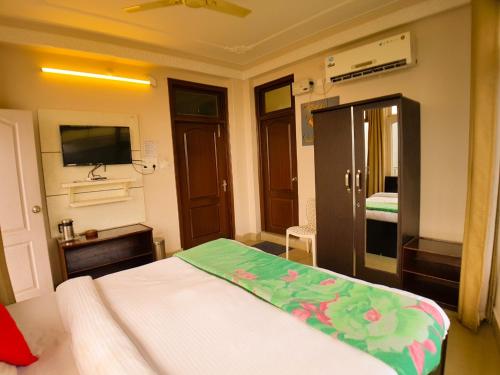 Postel nebo postele na pokoji v ubytování Hotel Cozy Nook
