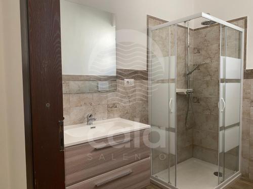 a bathroom with a shower and a sink at Villa Tortuga By Cala Salento in Torre Lapillo