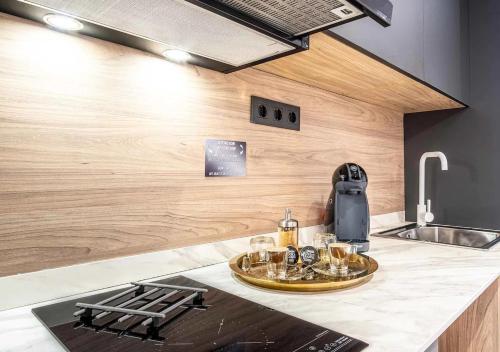 A kitchen or kitchenette at Poem Apartments, Las Canteras