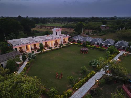 an aerial view of a large house with a large yard at Ranthambore Nature Camp Resort in Sawāi Mādhopur
