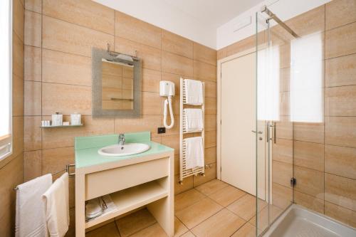 Koupelna v ubytování Hotel Cora