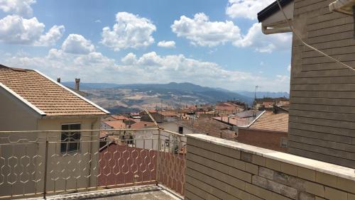 a view of a city from a balcony at La tua casa vicino Matera in Grassano