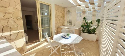 En balkon eller terrasse på Branco Suites - Rooms & Holiday Apartments