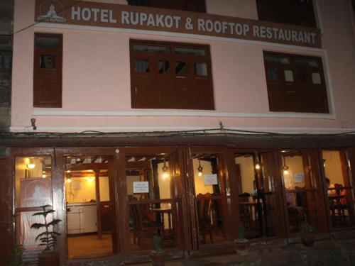 a building with a hotel rumport and roof top restaurant at HOTEL RUPAKOT AND ROOFTOP RESTAURANT in Bhaktapur