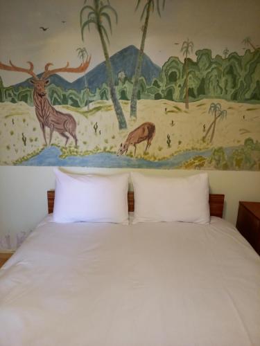 Postel nebo postele na pokoji v ubytování SELINA GUEST HOUSE
