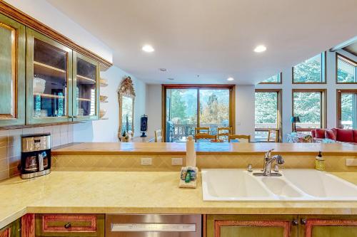 a kitchen with a sink and a counter top at Baldy View Lodge in Ketchum