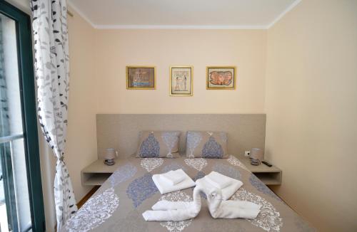 Кровать или кровати в номере Promenade,5 min Old Town