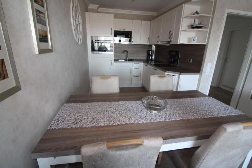 Η κουζίνα ή μικρή κουζίνα στο Haus Norderhoog Wohnung 34