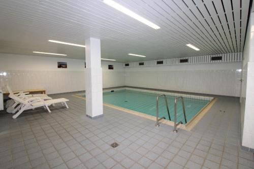 Πισίνα στο ή κοντά στο Haus Norderhoog Wohnung 34