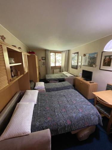 Katil atau katil-katil dalam bilik di Appartamento Val di Luce