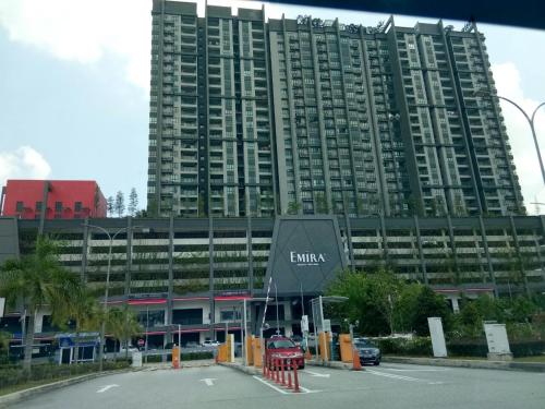 a large building with a parking lot in front of it at Aldridge Residence Executive Suite 2B@Shah Alam in Shah Alam