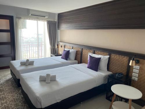 Katil atau katil-katil dalam bilik di Nordwind Hotel