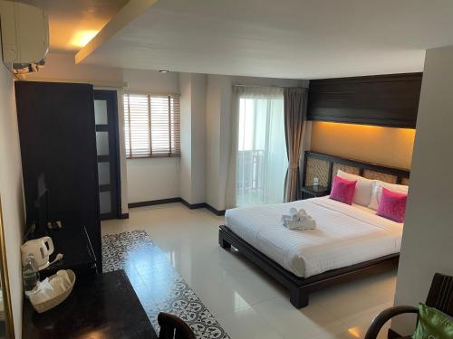 Katil atau katil-katil dalam bilik di Nordwind Hotel