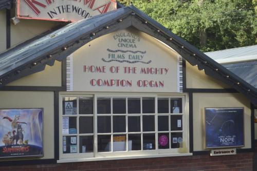 a home of the mighty convention open sign on a building at Victoria Lodge Woodhall Spa in Woodhall Spa