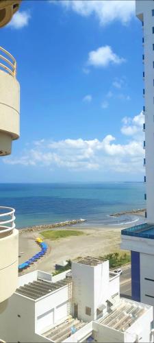 a view of the ocean from a building at Cabrero Beach 1111 in Cartagena de Indias