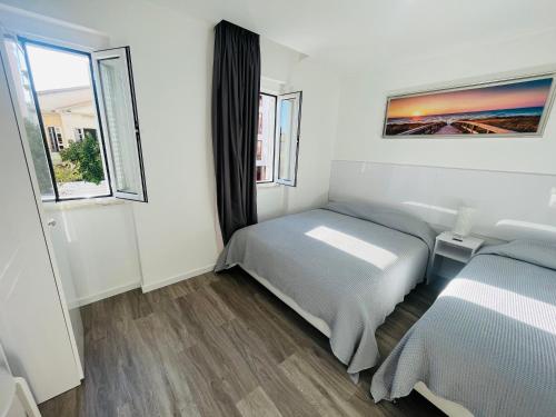 Letto o letti in una camera di Lisbon Ocean Apartments