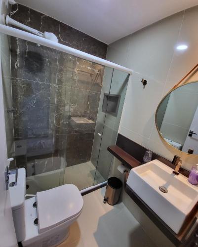 a bathroom with a shower and a toilet and a sink at Monte Castelo | Gravatá in Bezerros