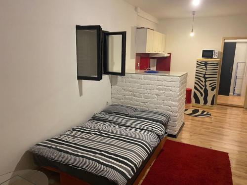 Posteľ alebo postele v izbe v ubytovaní Adorable 1-bedroom guesthouse & private parking place