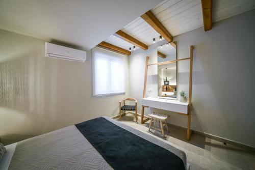 Postel nebo postele na pokoji v ubytování Lenikos Resort