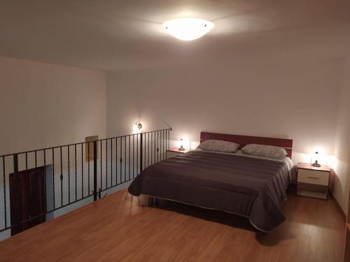 Posteľ alebo postele v izbe v ubytovaní Antico Borgo