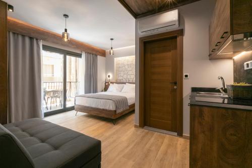 Ένα ή περισσότερα κρεβάτια σε δωμάτιο στο ridos house