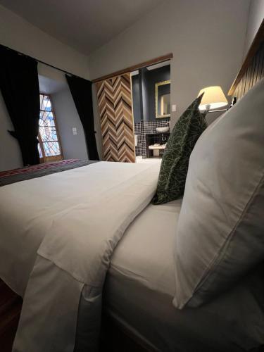 Cama ou camas em um quarto em Casa Tunki