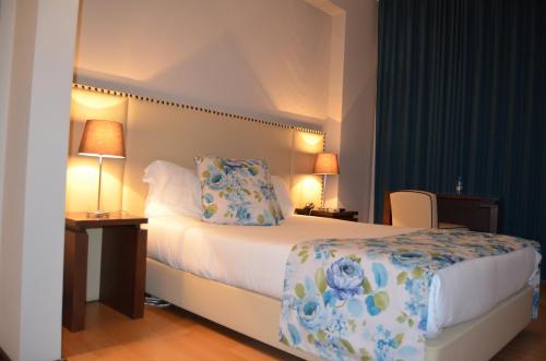 Hotel Torres Novasにあるベッド