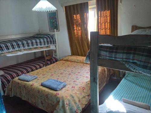 Ein Etagenbett oder Etagenbetten in einem Zimmer der Unterkunft HOSTEL ATG