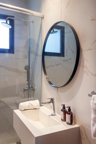 a bathroom with a sink and a mirror at Live Soho Boutique Apartments Palermo Soho in Buenos Aires
