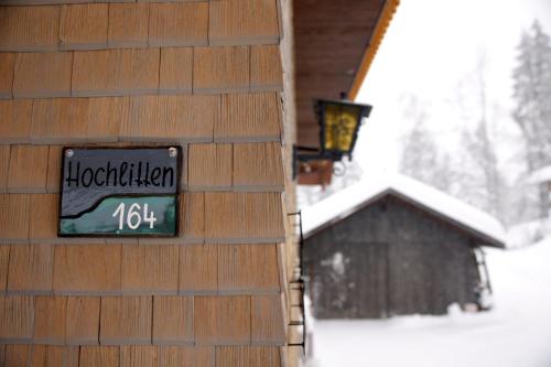 a sign on the side of a building at Zum Hirsch in Riefensberg