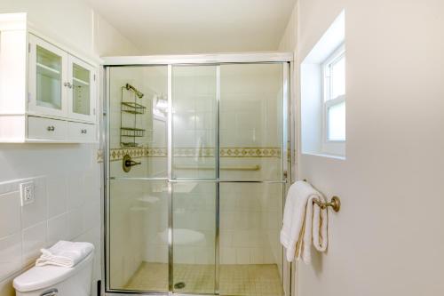 a bathroom with a shower and a toilet at Pompano Treasure in Pompano Beach