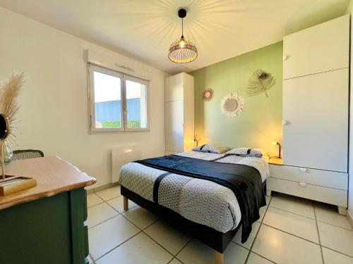 Postel nebo postele na pokoji v ubytování COC - Villa Les Embruns