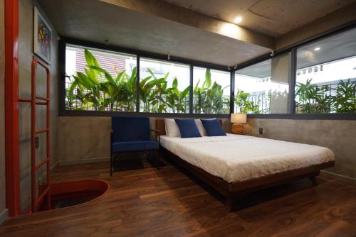 Un ou plusieurs lits dans un hébergement de l'établissement Soc House 2