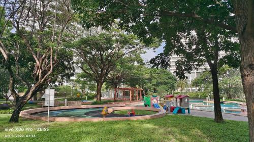 a park with a playground with a slide at Boathouse Hua Hin Seaview in Ban Bo Fai