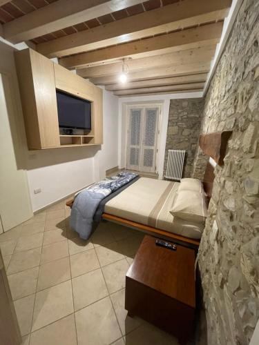 מיטה או מיטות בחדר ב-La Berzigala