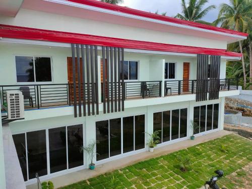 an aerial view of a house at Elnora Delmar Travellers Inn in Siquijor