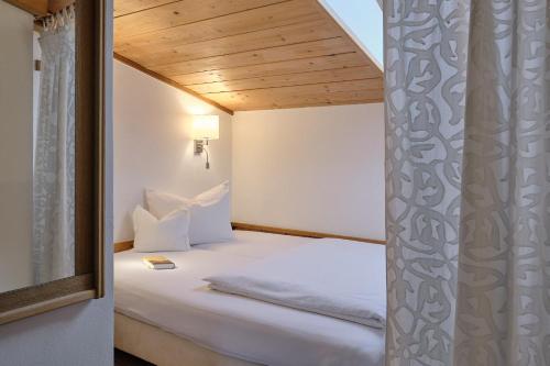 Postel nebo postele na pokoji v ubytování Pension Landhaus Gasteiger