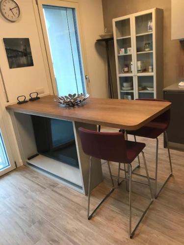 a table with a pair of glasses on top of it at SKYLINE MILANO Fiera in Milan