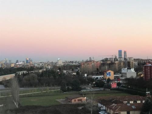a view of a city with buildings in the background at SKYLINE MILANO Fiera in Milan
