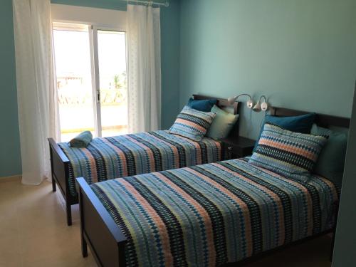 Posteľ alebo postele v izbe v ubytovaní Burriana Beach, Pool, big terrace, superb Seaviews