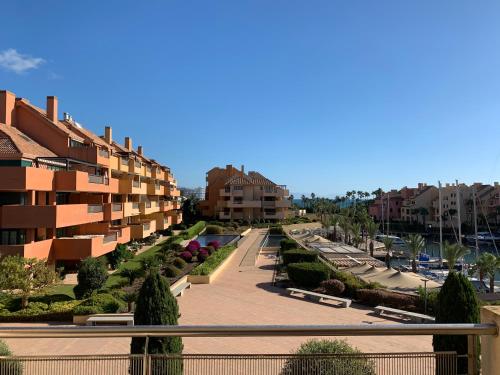 a view of a street in a city with buildings at Sotogrande Ribera Marlin in Sotogrande