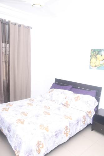 Cama o camas de una habitación en Koring Residence at Dalaba Estate