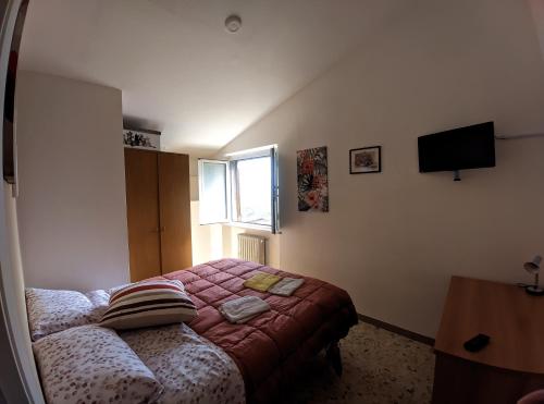Giường trong phòng chung tại Casa Sant'Ercolano