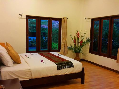 Postel nebo postele na pokoji v ubytování Banburi Villa