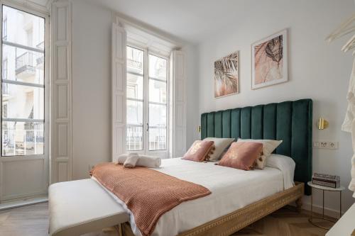 מיטה או מיטות בחדר ב-Arabica Suites - Lujosas Suites Room con Chimenea en Granada - Centro