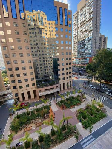 an aerial view of a city with tall buildings at São Paulo Moema Times Square - Suite LUXO in Sao Paulo